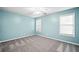 The light and bright bedroom features two windows and neutral paint at 1483 Chamirey Sw Dr, Marietta, GA 30008