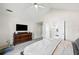 Spacious main bedroom with plush carpet and vaulted ceilings at 1483 Chamirey Sw Dr, Marietta, GA 30008