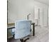 This is an office space featuring an office chair and desk with light gray carpet at 1483 Chamirey Sw Dr, Marietta, GA 30008