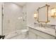Beautiful bathroom featuring a glass-enclosed shower, marble countertop, and elegant fixtures at 1501 Harts Mill Ne Rd, Brookhaven, GA 30319
