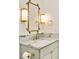 Beautiful bathroom featuring a glass-enclosed shower, marble countertop, and elegant fixtures at 1501 Harts Mill Ne Rd, Brookhaven, GA 30319