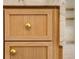 Detailed cabinet drawers with a gold knob and marble countertop at 1501 Harts Mill Ne Rd, Brookhaven, GA 30319