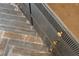 The dark gray flooring has a herringbone pattern with gold fixtures at 1501 Harts Mill Ne Rd, Brookhaven, GA 30319