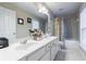 Bathroom with dual sinks, lots of counterspace and a shower/tub combo at 3226 Saville Sw St, Atlanta, GA 30331