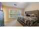 Spacious bedroom featuring large windows and vaulted ceilings for enhanced comfort at 3226 Saville Sw St, Atlanta, GA 30331