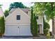 Charming two-story home with a well-maintained front yard and a two-car garage at 3226 Saville Sw St, Atlanta, GA 30331