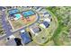 Aerial view of a home near tennis courts, pool, and other community amenities at 5530 Bower Pl, Cumming, GA 30028