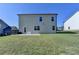 Spacious backyard features a concrete patio and plenty of green space at 5530 Bower Pl, Cumming, GA 30028