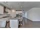 Spacious kitchen with stainless steel appliances and modern recessed lighting at 5530 Bower Pl, Cumming, GA 30028