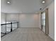 Bright and airy loft space with windows and recessed lighting, ready for customization at 5530 Bower Pl, Cumming, GA 30028