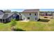 This home has a backyard with a green lawn and room to enjoy at 5530 Bower Pl, Cumming, GA 30028