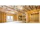 An unfinished basement with exposed framing and utilities, ready for customization at 7636 Chestnut Hill Rd, Cumming, GA 30041