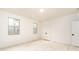 Bright bedroom with natural light from large windows and a double door closet at 7636 Chestnut Hill Rd, Cumming, GA 30041