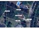 Aerial view of the property showing lot lines, pool and surrounding landscape, and street access at 223 Cheatham Rd, Acworth, GA 30101