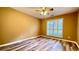 Bedroom with hardwood floors, ceiling fan, and plenty of natural lighting at 223 Cheatham Rd, Acworth, GA 30101