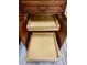 Custom wood kitchen cabinet with pullout drawers for easy storage at 223 Cheatham Rd, Acworth, GA 30101