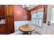 Dining area features wainscoting and a modern light fixture, creating a welcoming atmosphere at 223 Cheatham Rd, Acworth, GA 30101