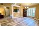 Dining room with hardwood floors, a chandelier, and large windows with shutter blinds at 223 Cheatham Rd, Acworth, GA 30101