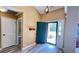 Welcoming foyer with an open view to the outside, wood flooring, and a coat rack at 223 Cheatham Rd, Acworth, GA 30101