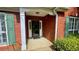 Close-up of the front door showing the house number, sidelights, and a welcoming entryway at 223 Cheatham Rd, Acworth, GA 30101