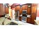 Updated kitchen featuring custom cabinets and stainless steel appliances at 223 Cheatham Rd, Acworth, GA 30101