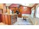Cozy kitchen with a granite countertop island, stainless steel appliances, and modern lighting at 223 Cheatham Rd, Acworth, GA 30101
