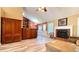 Inviting living room featuring hardwood floors, a fireplace, and custom built-in cabinetry at 223 Cheatham Rd, Acworth, GA 30101