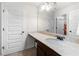 Well-lit bathroom with a granite vanity and ample cabinet storage space at 2745 Veltre Sw Ter, Atlanta, GA 30311