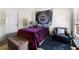Bedroom with soft textures, a tapestry, natural light, and a comfortable aesthetic at 2745 Veltre Sw Ter, Atlanta, GA 30311