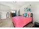 Cozy bedroom featuring a plush bed, carpet, and bright natural light at 2745 Veltre Sw Ter, Atlanta, GA 30311