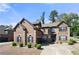 Inviting brick home with well-kept front yard, featuring classic shutters and a welcoming entrance, perfect for a Gathering at 2745 Veltre Sw Ter, Atlanta, GA 30311