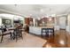 Spacious kitchen with an island, stainless appliances, and adjacent breakfast nook and living room at 2745 Veltre Sw Ter, Atlanta, GA 30311