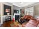 Cozy living room featuring a fireplace, comfortable seating, and a relaxing atmosphere at 2745 Veltre Sw Ter, Atlanta, GA 30311