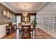 Elegant dining room featuring hardwood floors, modern lighting, and a decorative screen at 2920 Olde Towne Pkwy, Duluth, GA 30097