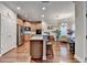 Open-concept living area features hardwood floors, fireplace, and stylish furniture at 2920 Olde Towne Pkwy, Duluth, GA 30097
