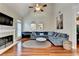 Inviting living room featuring vaulted ceiling, hardwood flooring, and fireplace at 2920 Olde Towne Pkwy, Duluth, GA 30097
