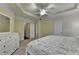 The main bedroom has a tray ceiling and a fan at 2920 Olde Towne Pkwy, Duluth, GA 30097