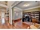 Spacious office featuring a decorative screen, hardwood floors, built-in shelving and large windows at 2920 Olde Towne Pkwy, Duluth, GA 30097