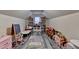 This playroom features storage shelves, hardwood floors and plenty of natural light at 2920 Olde Towne Pkwy, Duluth, GA 30097