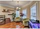 Cozy sitting area with two armchairs, plants, and built-in shelving at 2920 Olde Towne Pkwy, Duluth, GA 30097