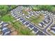 Aerial view of the neighborhood with sidewalks and landscaped yards at 4650 Sandy Creek Dr, Cumming, GA 30028