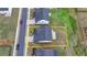 Aerial view of the two-story home with a long driveway and neatly maintained front and back lawn at 4650 Sandy Creek Dr, Cumming, GA 30028