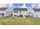 Aerial view of the backyard with a sliding door leading to the patio at 4650 Sandy Creek Dr, Cumming, GA 30028