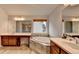 Well lit bathroom features a large tub, double sinks, a window and a separate shower at 4650 Sandy Creek Dr, Cumming, GA 30028