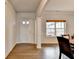 Bright dining room featuring hardwood floors, natural light, and elegant trim details at 4650 Sandy Creek Dr, Cumming, GA 30028