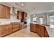 Modern kitchen with stainless steel appliances, sleek countertops, and a stylish backsplash at 4650 Sandy Creek Dr, Cumming, GA 30028
