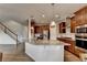 Gourmet kitchen with stainless steel appliances, granite countertops, and a large island for entertaining at 4650 Sandy Creek Dr, Cumming, GA 30028