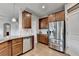 Well-lit kitchen features stainless steel appliances and granite countertops at 4650 Sandy Creek Dr, Cumming, GA 30028