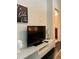 Hallway area with TV console and view into the bathroom at 860 Peachtree Ne St # 2616, Atlanta, GA 30308