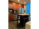 Modern kitchen featuring wooden cabinets, stainless steel appliances, and a kitchen island at 860 Peachtree Ne St # 2616, Atlanta, GA 30308